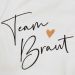 Schwarzer Team Braut-Schriftzug mit  kupferfarbenem Herz
