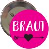 Pinkfarbener JGA Ansteck-Button mit Braut-Aufschrift und Herz mit Pfeil-Motiv
