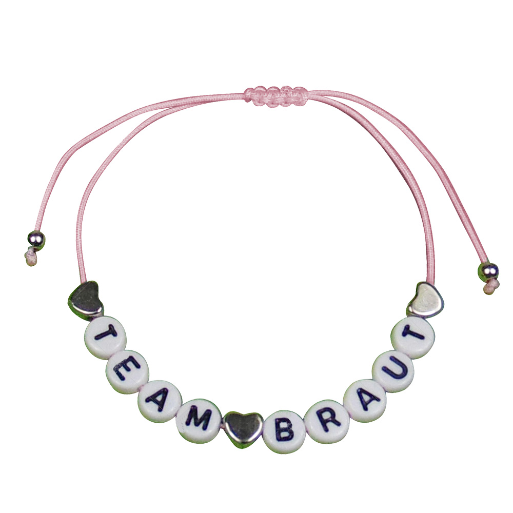 Rosafarbenes JGA Armband mit Herzen und Team Braut-Buchstaben