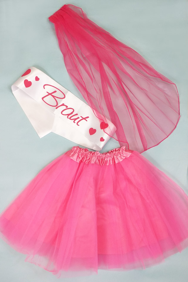 Pinkfarbenes Junggesellinnenabschied-Kostüm für die Braut
